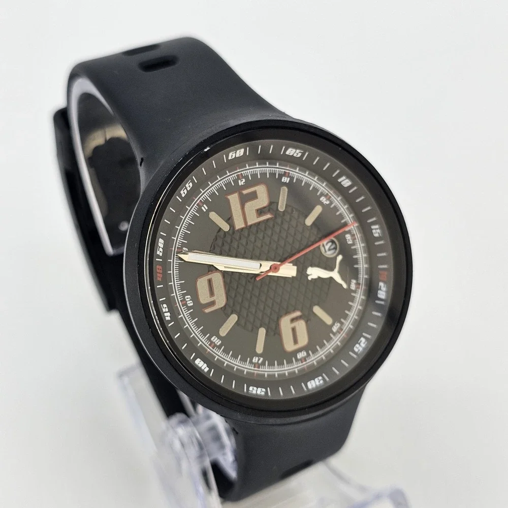 Puma Slick Men's Watch 45MM Black Dial Date Black Plastic Bands New Battery